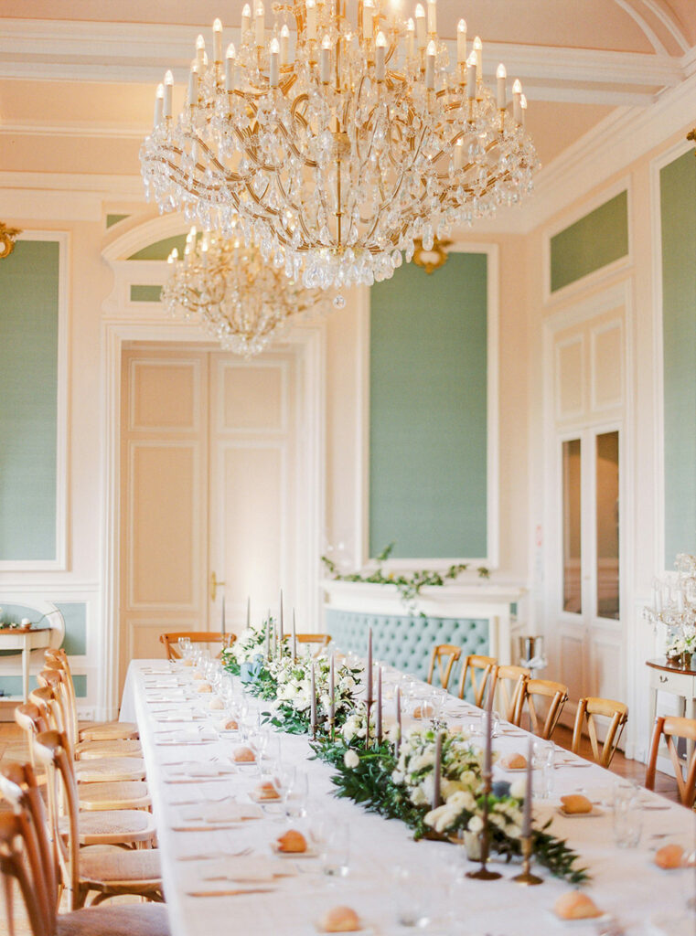 Wedding at Château de Bouffémont with an elegant indoor dinner.
