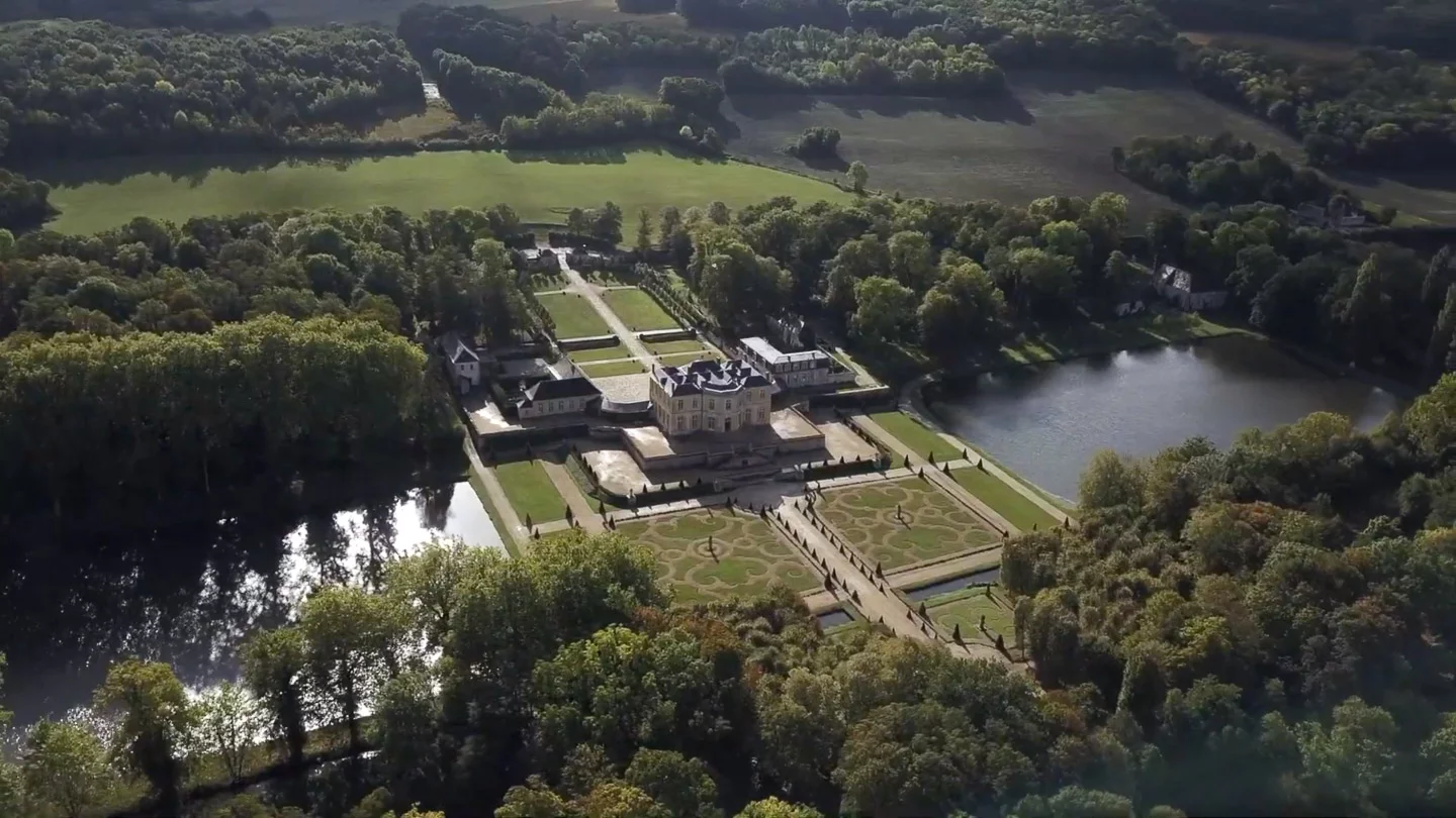 Château de Villette with aerial views of the château, gardens, and lake.
