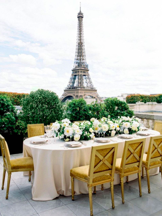 An intimate rooftop dining experience with panoramic views during a Wedding at Hotel Shangri La.