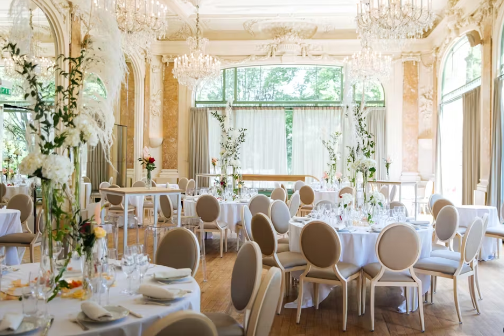 Round tables set for an elegant Wedding at Pavillon Dauphine.

