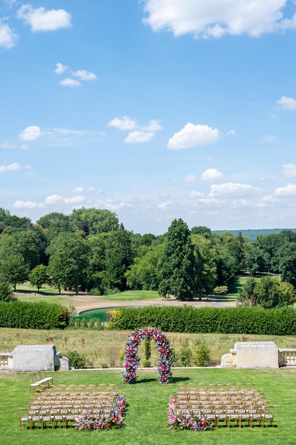 Wedding at Château de Bouffémont surrounded by gardens for an elegant ceremony.
