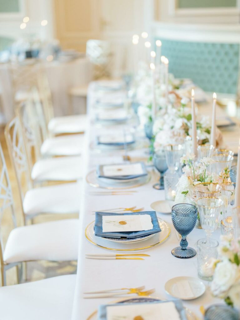 Château de Bouffémont featuring an elegant banquet setup.
